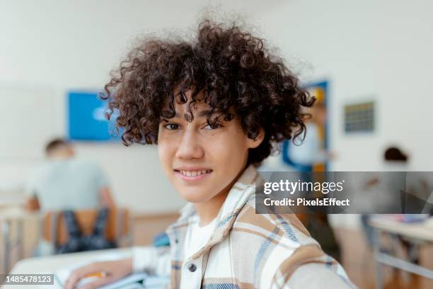 school and portrait boy - 14 year old biracial girl curly hair stock pictures, royalty-free photos & images