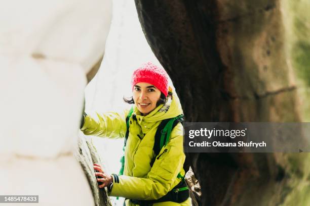 woman in the cave during hiking - inner courage stock pictures, royalty-free photos & images
