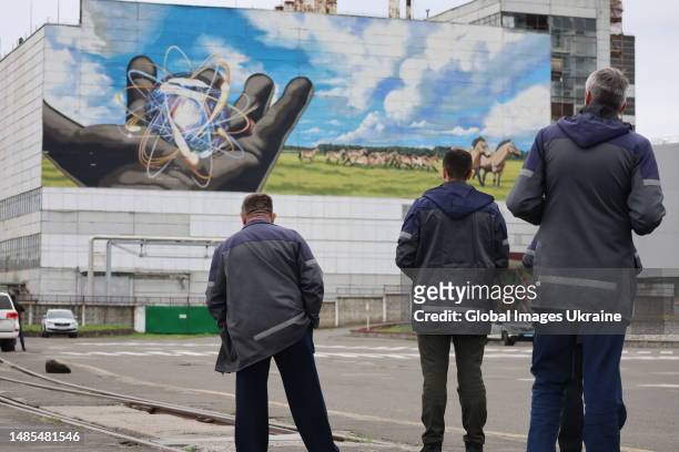 Employees of the Chernobyl Nuclear Power Plant plant during the 37th anniversary of honoring the memory of the Chernobyl disaster victims on April...
