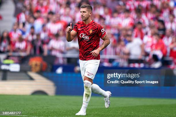 Matija Nastasic of RCD Mallorca celebrates after scoring their side's first goal during the LaLiga Santander match between Atletico de Madrid and RCD...