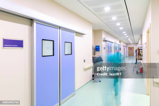 operating room corridor - abandoned hospital stock pictures, royalty-free photos & images