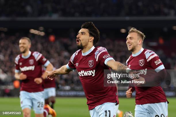 Lucas Paqueta of West Ham United celebrates after scoring the team's first goal with teammates during the Premier League match between West Ham...