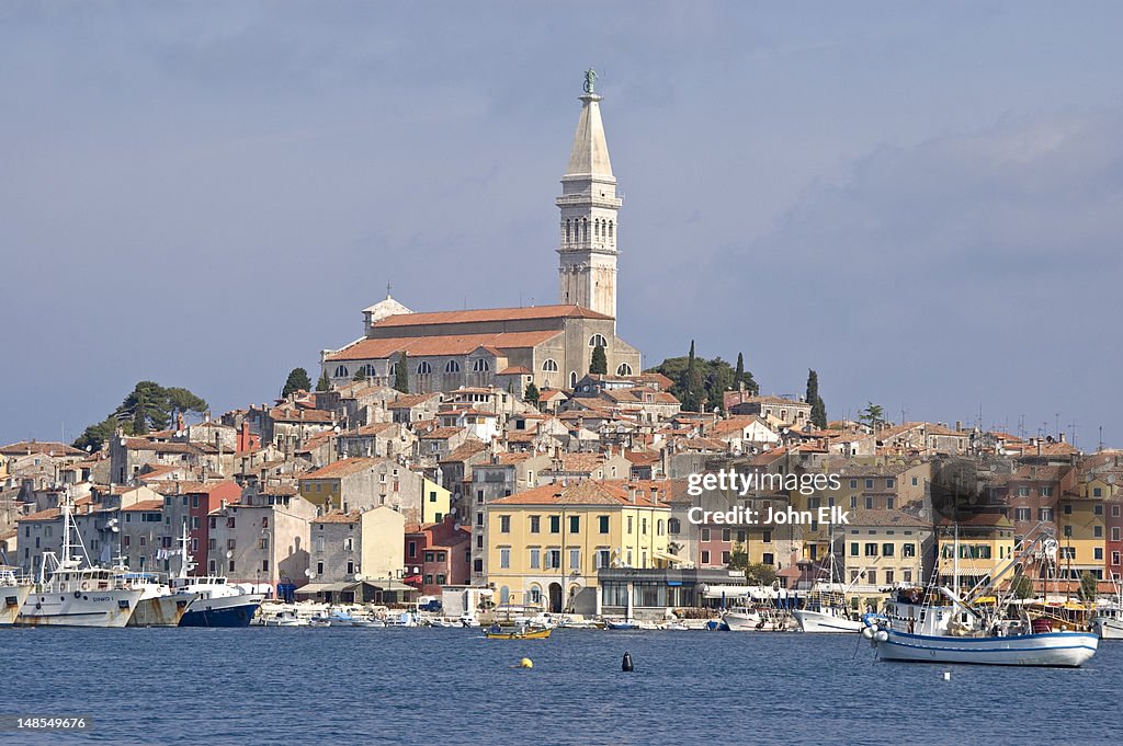 City with cathedral from across harbour.