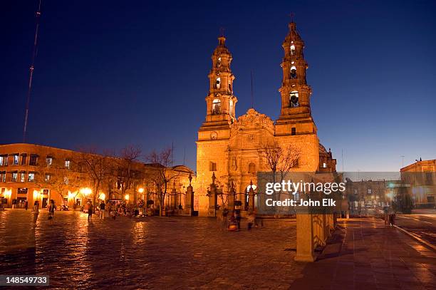 aguascalientes cathedral lit at night. - aguas calientes stock pictures, royalty-free photos & images