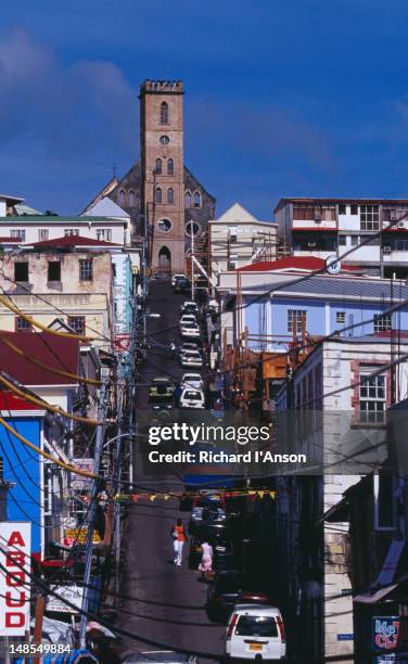 cathedral of immaculate conception at end of city street. - winward road stock pictures, royalty-free photos & images