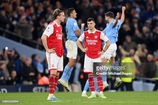 Granit Xhaka of Arsenal reacts after Manchester City scored their sides second goal during the Premier League match between Manchester City and...
