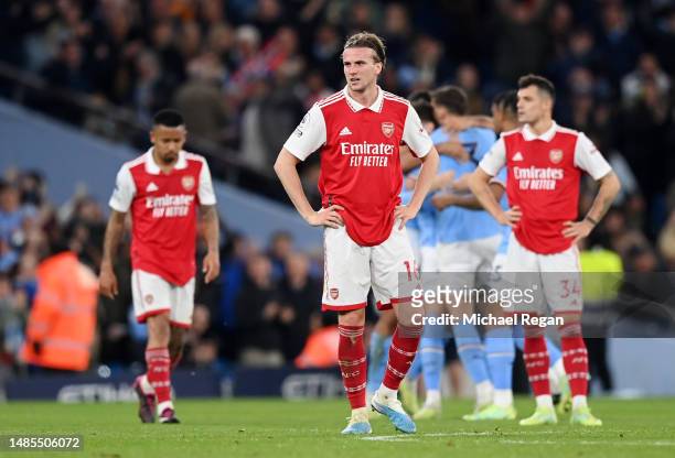 Rob Holding of Arsenal looks dejected after Manchester City scored their sides second goal during the Premier League match between Manchester City...