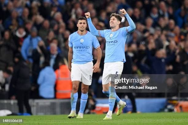 John Stones of Manchester City celebrates after scoring the team's second goal after a VAR check during the Premier League match between Manchester...