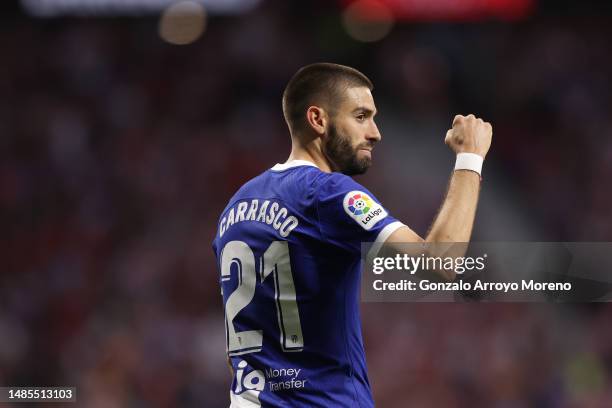 Yannick Carrasco of Atletico de Madrid celebrates scoring their third goal during the LaLiga Santander match between Atletico de Madrid and RCD...