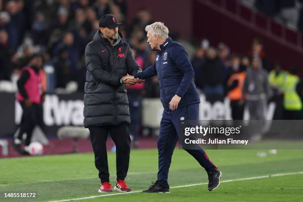 Juergen Klopp, Manager of Liverpool, shakes hands with David Moyes, Manager of West Ham United, after the Premier League match between West Ham...
