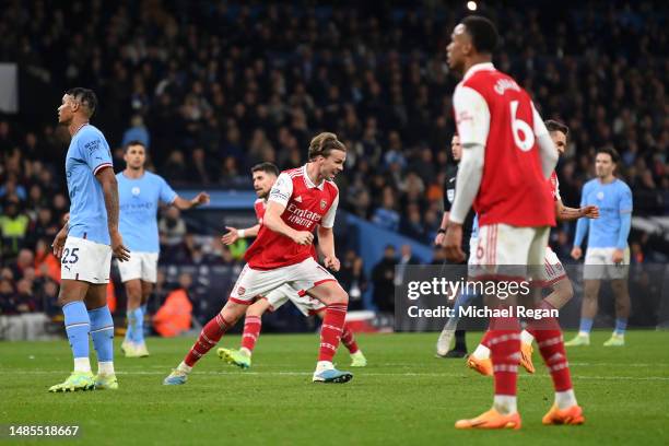 Rob Holding of Arsenal celebrates after scoring the team's first goal during the Premier League match between Manchester City and Arsenal FC at...