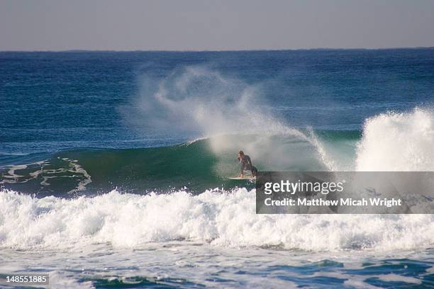 surfer on wave at ansteys beach. - durban stock-fotos und bilder