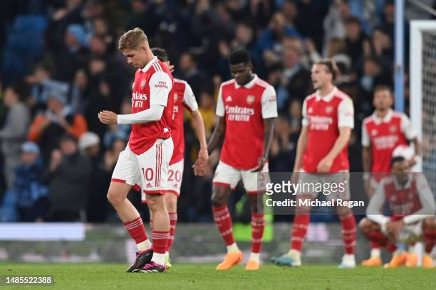 Emile Smith Rowe of Arsenal looks dejected after Erling Haaland of Manchester City scored their sides fourth goal during the Premier League match...