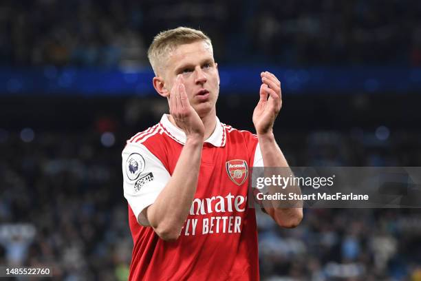 Oleksandr Zinchenko of Arsenal, applauds the fans after the team's defeat in the Premier League match between Manchester City and Arsenal FC at...