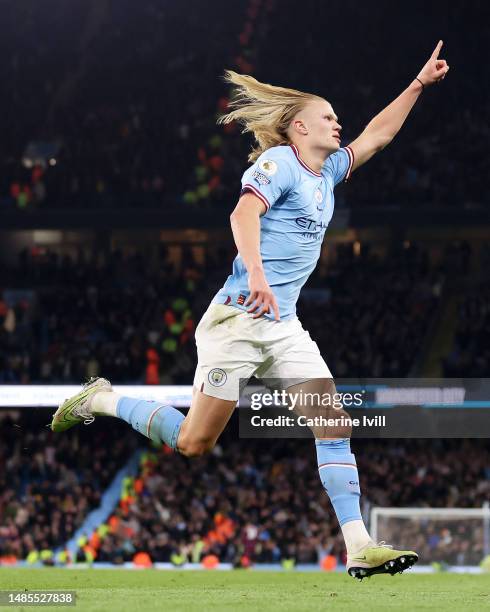 Erling Haaland of Manchester City celebrates after scoring the team's fourth goal during the Premier League match between Manchester City and Arsenal...