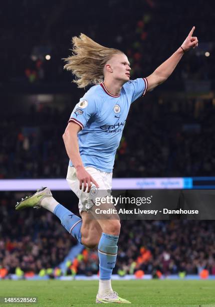 Erling Haaland of Manchester City celebrates after scoring their fourth goal during the Premier League match between Manchester City and Arsenal FC...