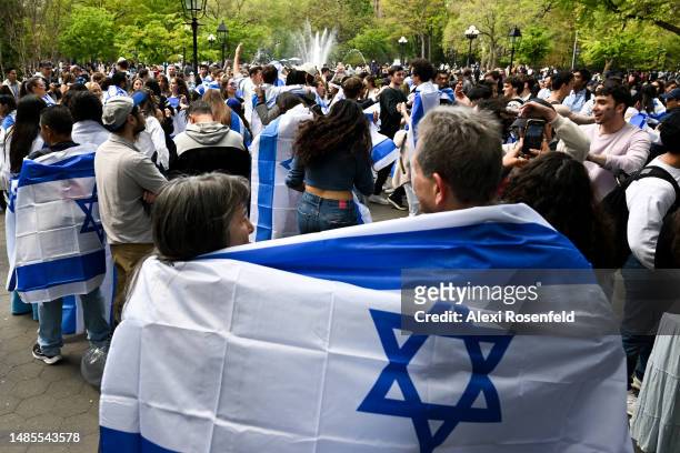 People celebrate Israel's 75th Independence Day at the 'Yom Haatzmaut Rave In The Park' in Washington Square Park on April 26, 2023 in New York City....