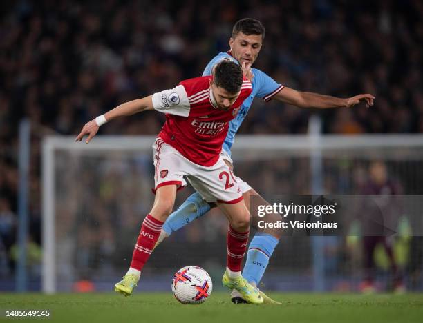 Rodri of Manchester City and Jorginho of Arsenal in action during the Premier League match between Manchester City and Arsenal FC at Etihad Stadium...