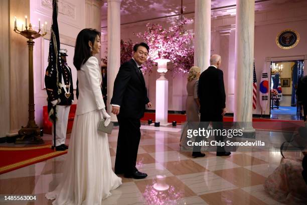 South Korean first lady Kim Keon-hee and South Korean President Yoon Suk-yeol follow first lady Jill Biden and U.S. President Joe Biden into the...