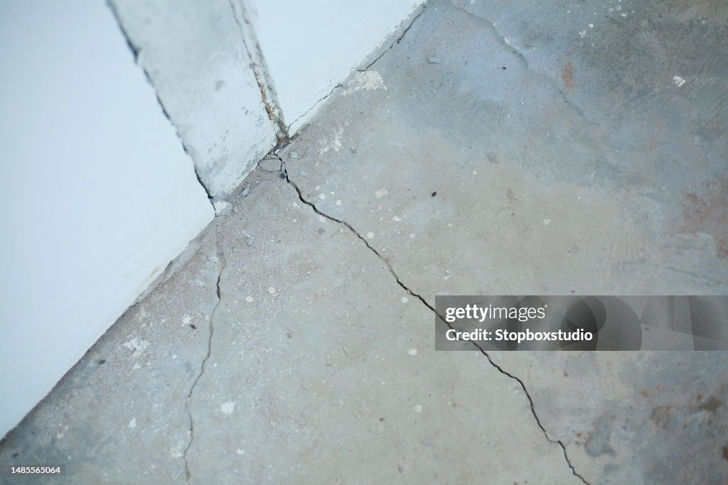 Cracked Concrete Floor High-Res Stock Photo - Getty Images