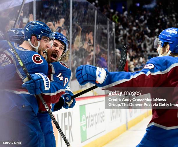 Devon Toews of the Colorado Avalanche celebrates his game winning goal against the Seattle Kraken with teammates Artturi Lehkonen , second from left,...