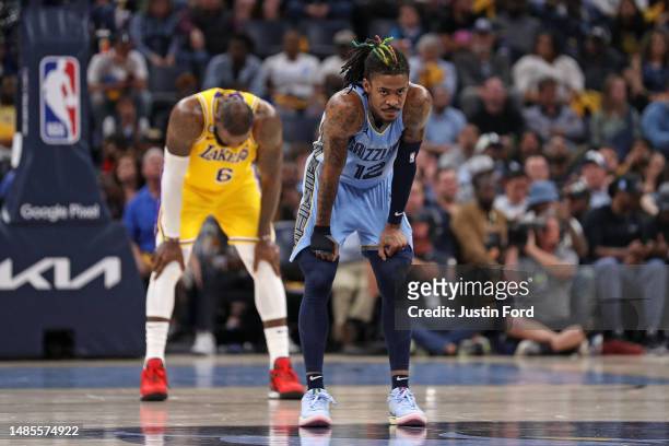 Ja Morant of the Memphis Grizzlies and LeBron James of the Los Angeles Lakers during the first half of Game Five of the Western Conference First...