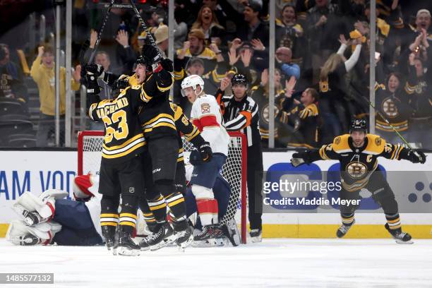 Brad Marchand of the Boston Bruins celebrates with Tyler Bertuzzi after scoring a goal on Sergei Bobrovsky of the Florida Panthers during the second...