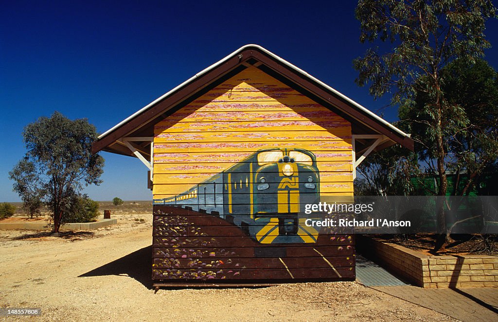 The Indian Pacific Railway passes through the tiny town of Cook where it is also immortalised on this weatherboard building.