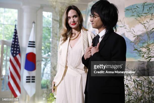 Actress Angelina Jolie and her son Maddox arrive for the White House state dinner for South Korean President Yoon Suk-yeol on April 26, 2023 in...