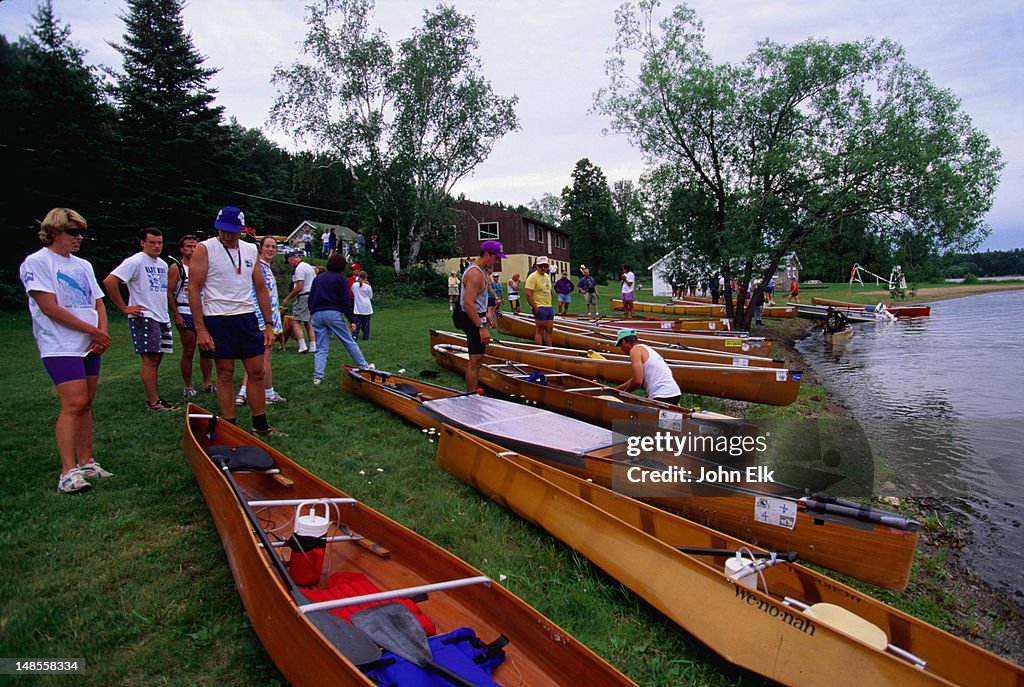 Competitors readying themselves for the canoe race at the Blueberry Festival - Ely, Minnesota