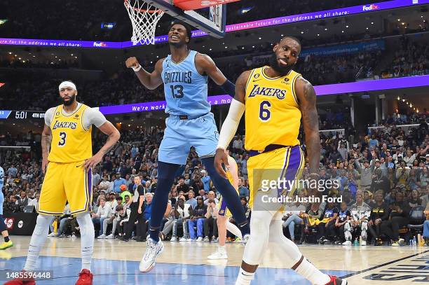 Jaren Jackson Jr. #13 of the Memphis Grizzlies reacts during the second half against Anthony Davis of the Los Angeles Lakers and LeBron James of the...