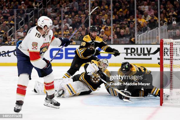 Matthew Tkachuk of the Florida Panthers scores the game winning goal on Linus Ullmark of the Boston Bruins during overtime in Game Five of the First...