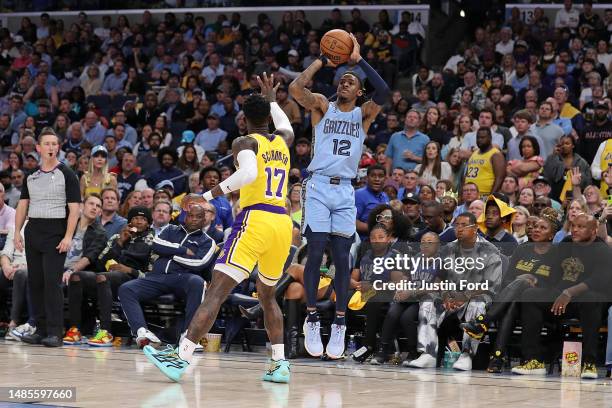 Ja Morant of the Memphis Grizzlies takes a shot against Dennis Schroder of the Los Angeles Lakers during the second half of Game Five of the Western...