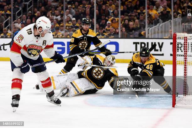 Matthew Tkachuk of the Florida Panthers scores the game winning goal on Linus Ullmark of the Boston Bruins during overtime in Game Five of the First...