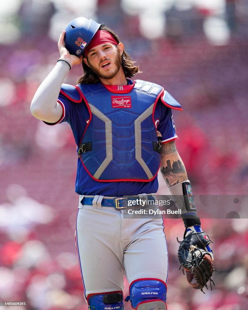 Texas Ranger Heim Jonah Heim of the Texas Rangers walks across the field in the fourth ...