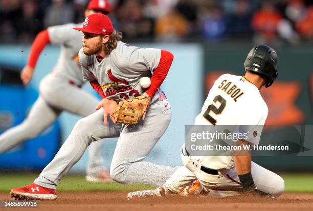 Blake Sabol of the San Francisco Giants steals second base as Brendan Donovan of the St. Louis Cardinals can't handle the throw down in the bottom of...