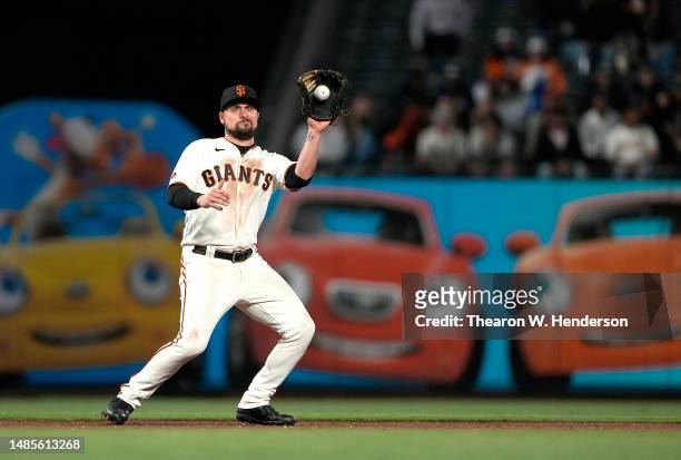 Davis of the San Francisco Giants catches a line drive hit by Tyler O'Neill of the St. Louis Cardinals in the top of the six inning at Oracle Park on...