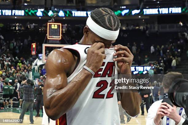 Jimmy Butler of the Miami Heat reacts after defeating the Milwaukee Bucks in overtime in Game 5 of the Eastern Conference First Round Playoffs at...