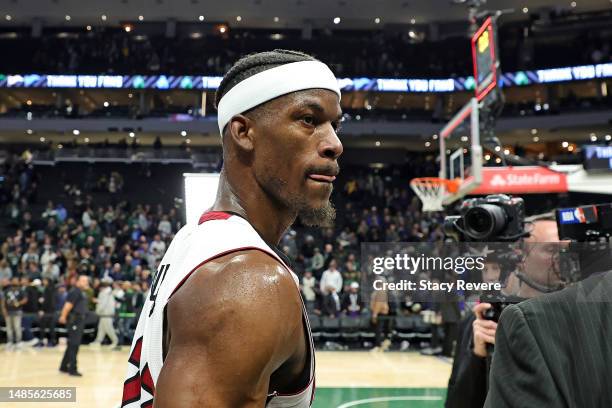 Jimmy Butler of the Miami Heat reacts after defeating the Milwaukee Bucks in overtime in Game 5 of the Eastern Conference First Round Playoffs at...