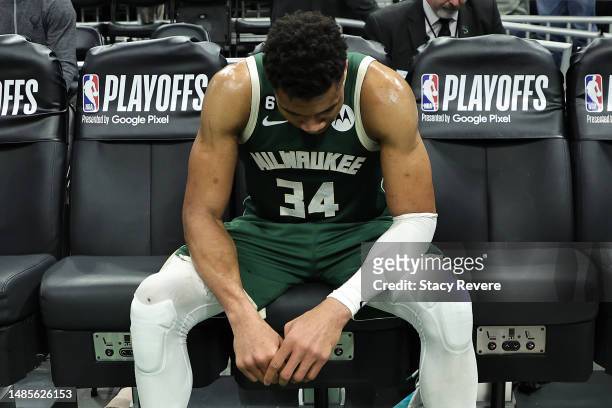 Giannis Antetokounmpo of the Milwaukee Bucks sits on the bench after losing Game 5 of the Eastern Conference First Round Playoffs against the Miami...