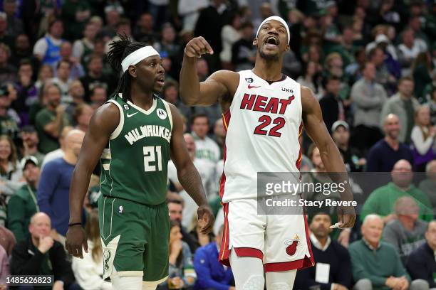 Jimmy Butler of the Miami Heat and Jrue Holiday of the Milwaukee Bucks exchange words during the second half of Game 5 of the Eastern Conference...