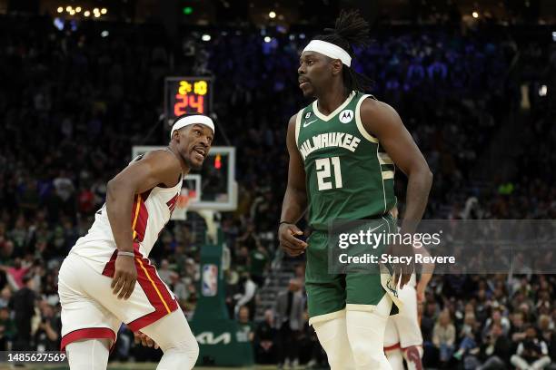 Jimmy Butler of the Miami Heat and Jrue Holiday of the Milwaukee Bucks exchange words during the second half of Game 5 of the Eastern Conference...