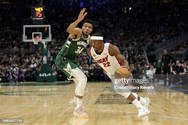 Jimmy Butler of the Miami Heat drives around Giannis Antetokounmpo of the Milwaukee Bucks during the second half of Game 5 of the Eastern Conference...