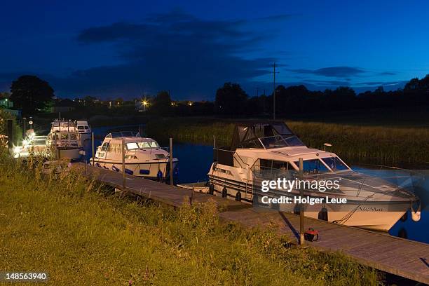 boats docked on river erne. - cavan images stock pictures, royalty-free photos & images