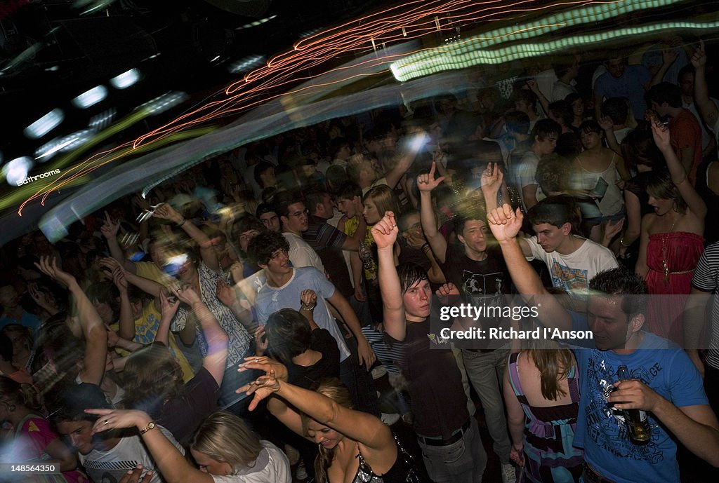 Dancing at Uber nightclub in West End.