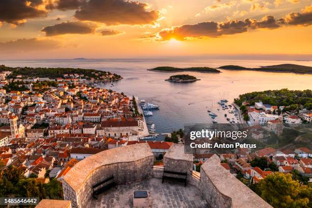 beautiful sunset view of hvar at sunset. hvar island, croatia - dalmatia region croatia stock pictures, royalty-free photos & images