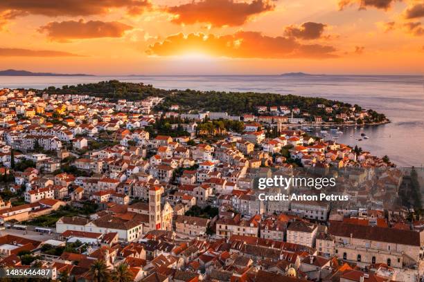 beautiful sunset view of hvar at sunset. hvar island, croatia - hvar stockfoto's en -beelden