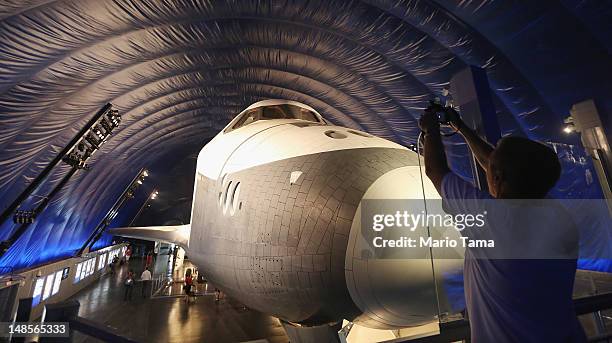 The Space Shuttle Enterprise is seen at a press preview of the Intrepid Sea, Air & Space Museum’s new Space Shuttle Pavilion on July 18, 2012 in New...