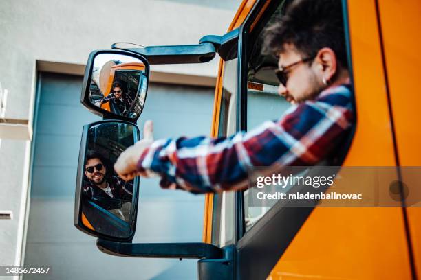 garbage removal worker - garbage truck driving stock pictures, royalty-free photos & images