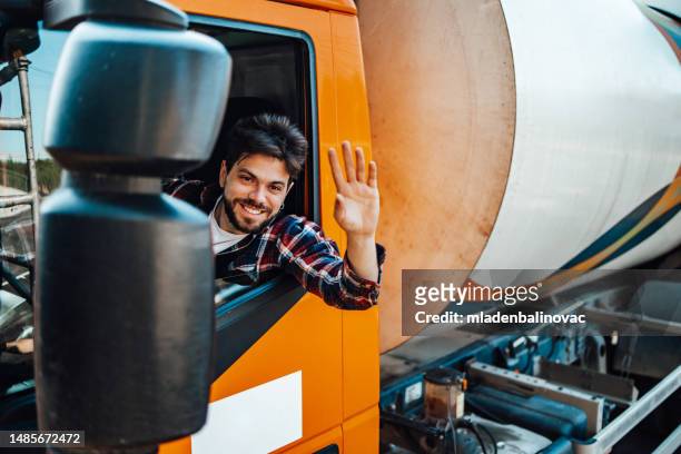 garbage removal worker - garbage truck driving stock pictures, royalty-free photos & images